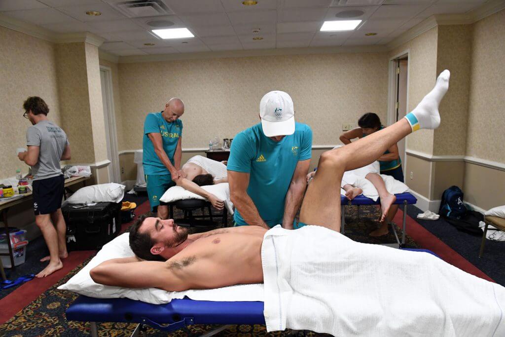 The Physio team working on the Australian Team Members inbetween training sessions. University of Auburn Aquatic Centre, Alabama USA. Australian Olympic Swimming Team are in their final training staging Camp before heading over to the Rio2016 Olympic Games. July 30 2016. Photo by Delly Carr. Pic credit mandatory for complimentary exclusive editorial usage. Thank You.