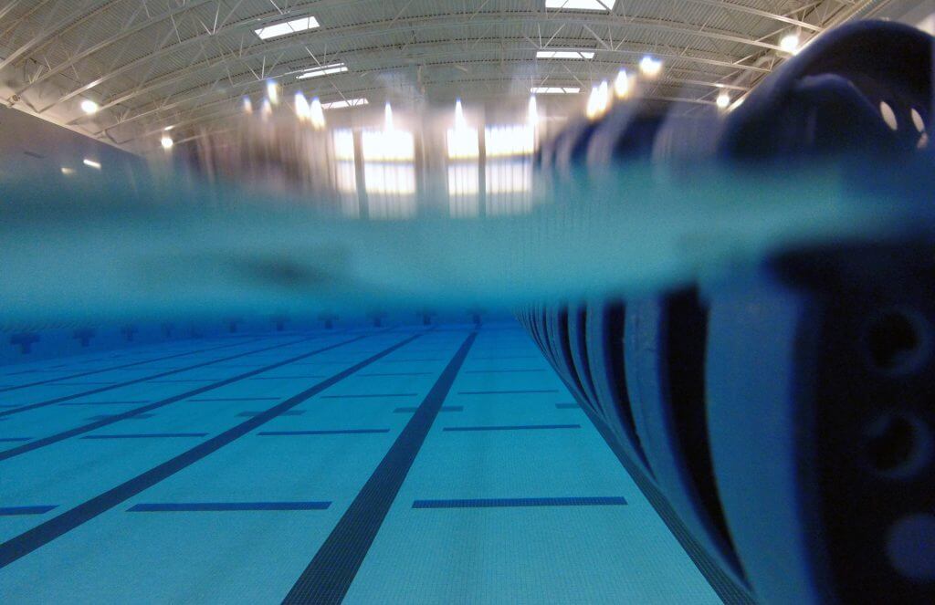 swimmer - coach - pool